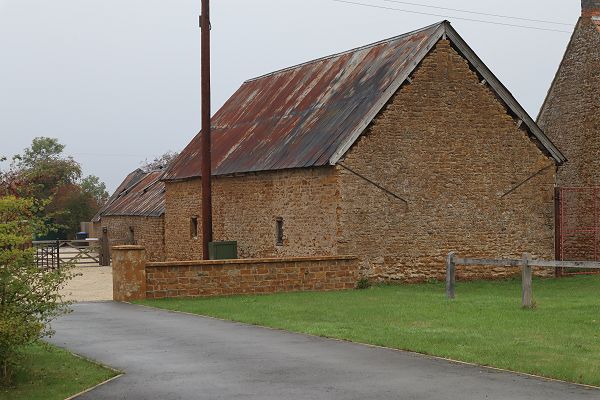Stone built barn with corrugated iron roof