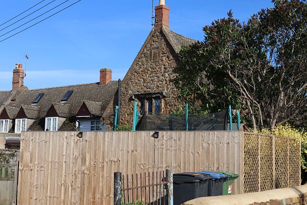 Terrace of three stone houses (rear view)