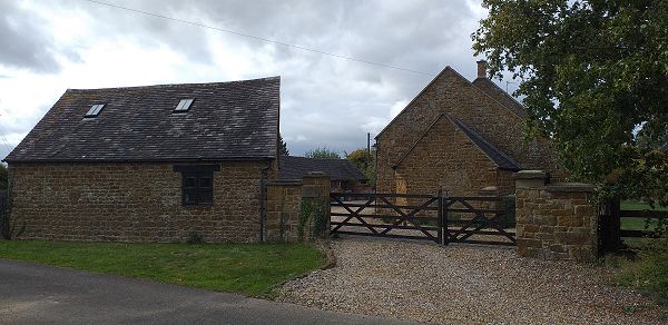 Entrance gateway to farmhouse and outbuildings