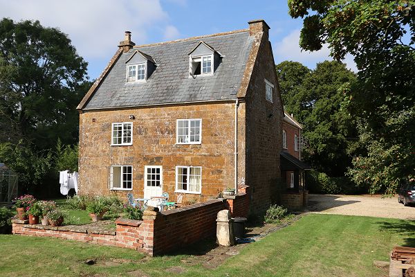 Cottage with walled front garden