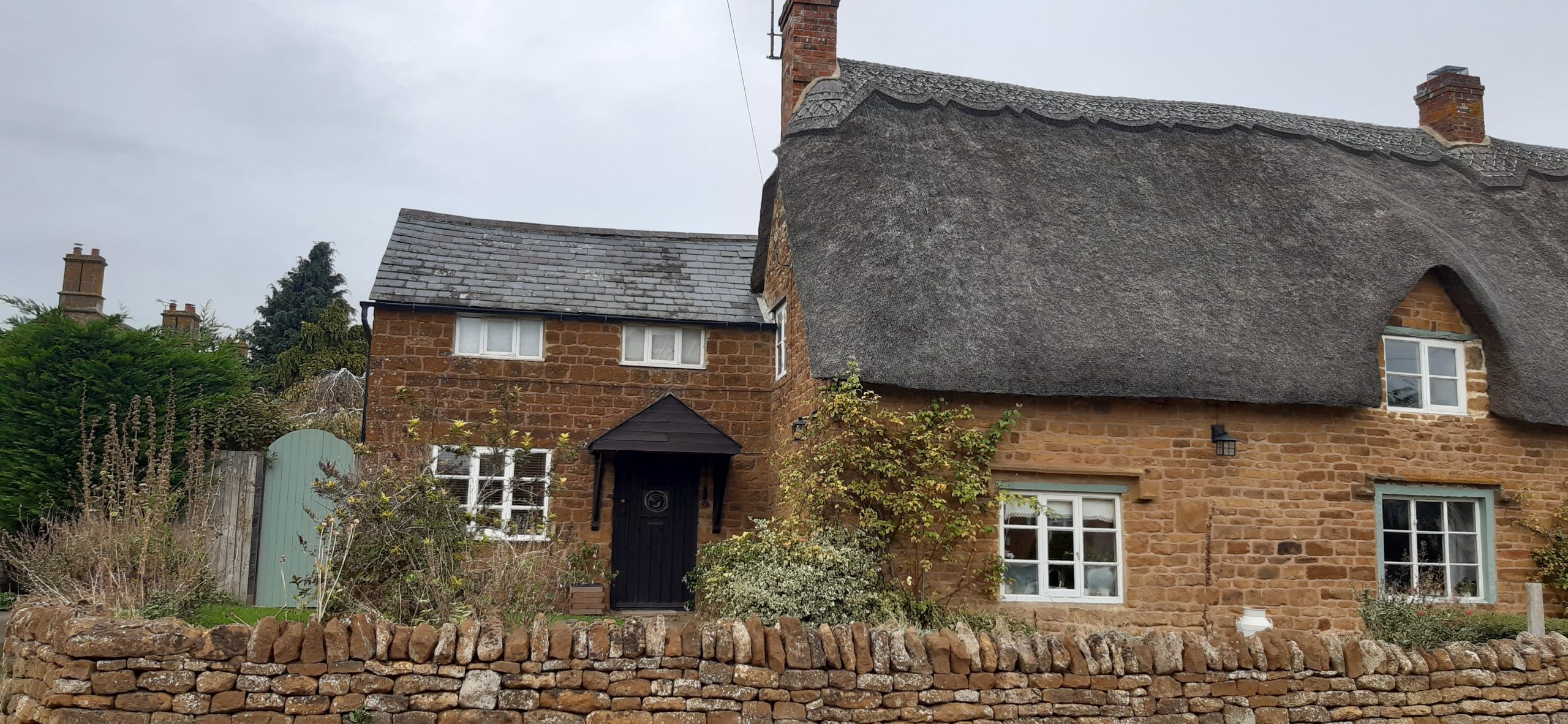 Small extension on the side of thatched house