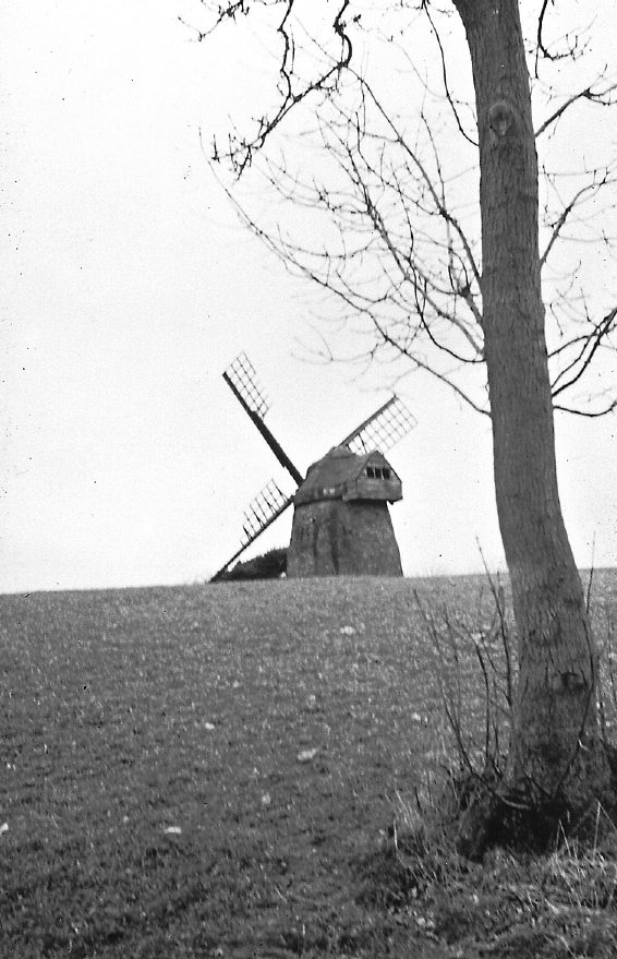 Windmill with damaged sails