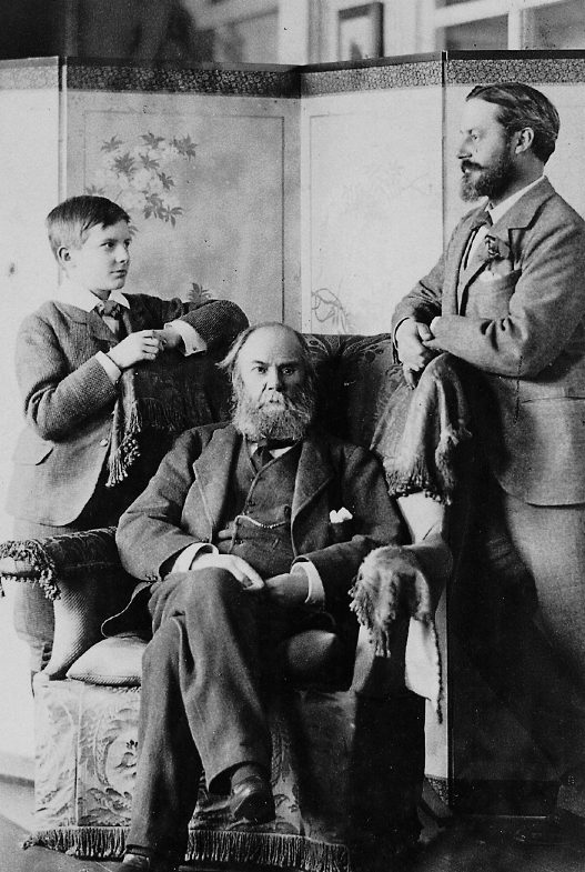 Three people in a family portrait