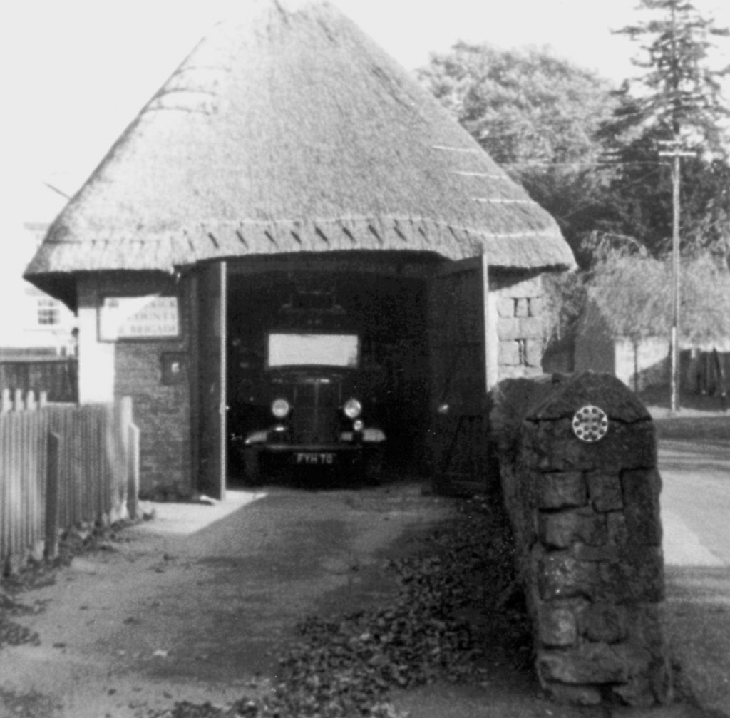 Vehicle inside thatched fire station
