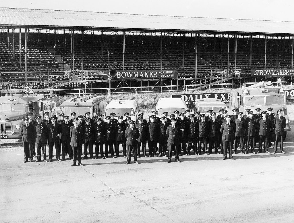 Marshalls at a motor racing circuit