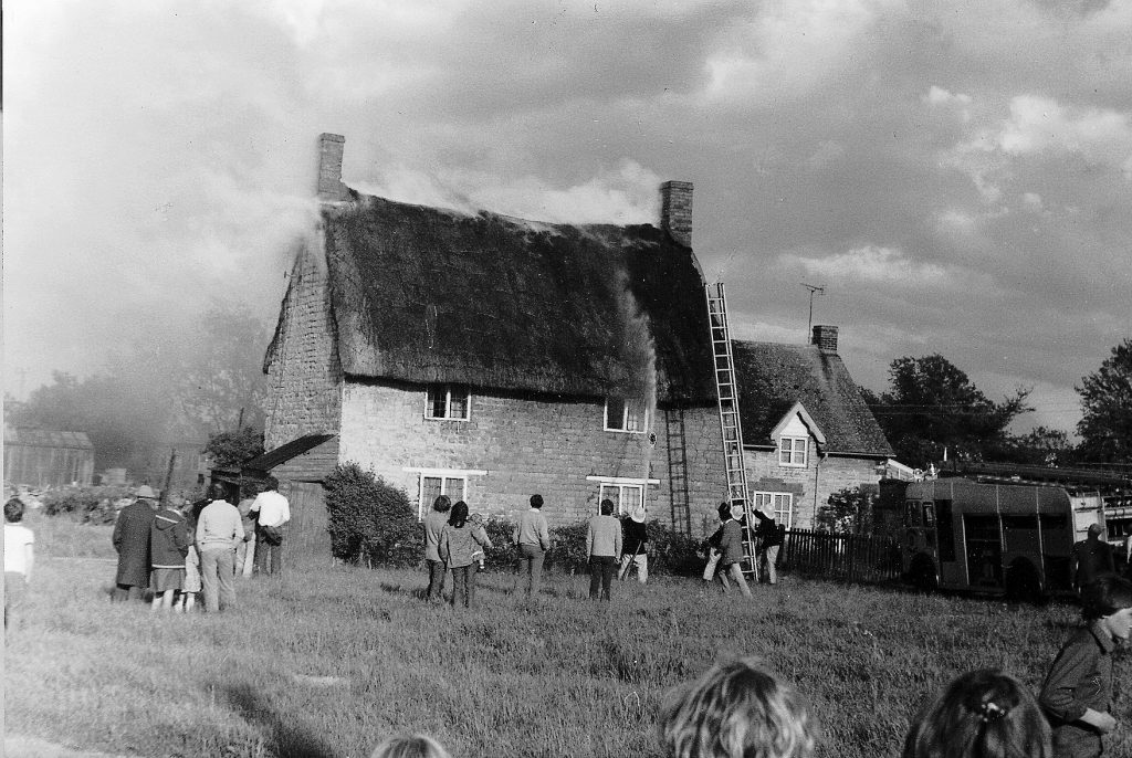Thatched roof on fire