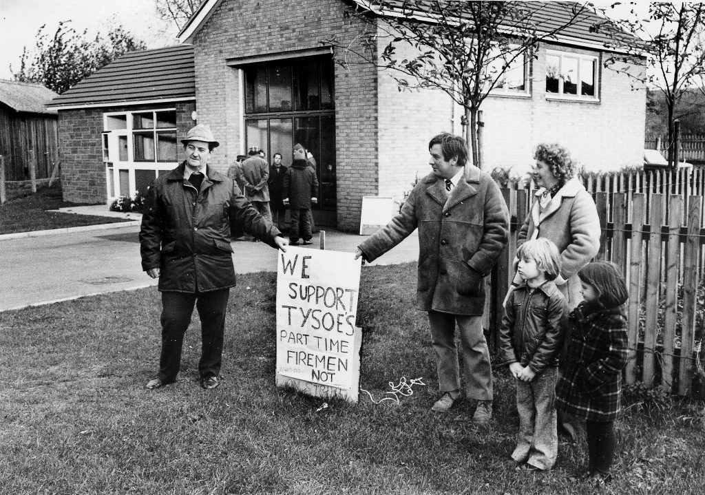 People attending a picket line demonstration