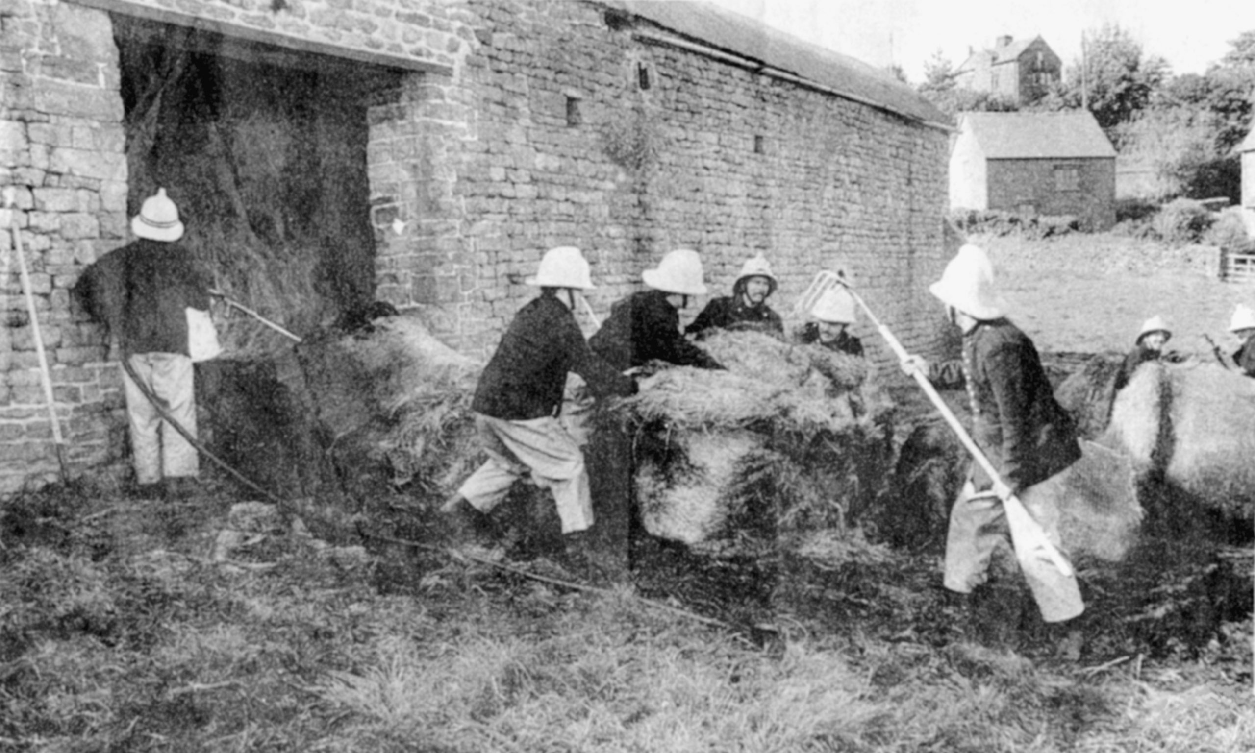 Fire brigade attending a barn fire