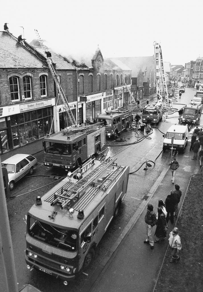 Multiple fire engines attending a town centre fire