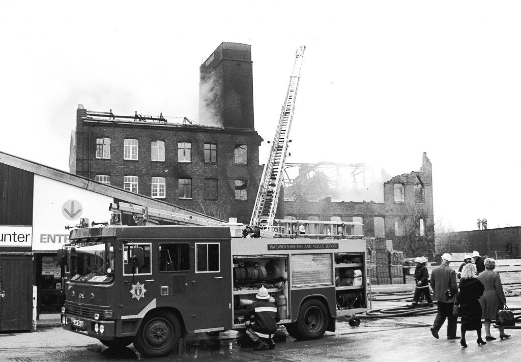 Fire brigade attending warehouse fire