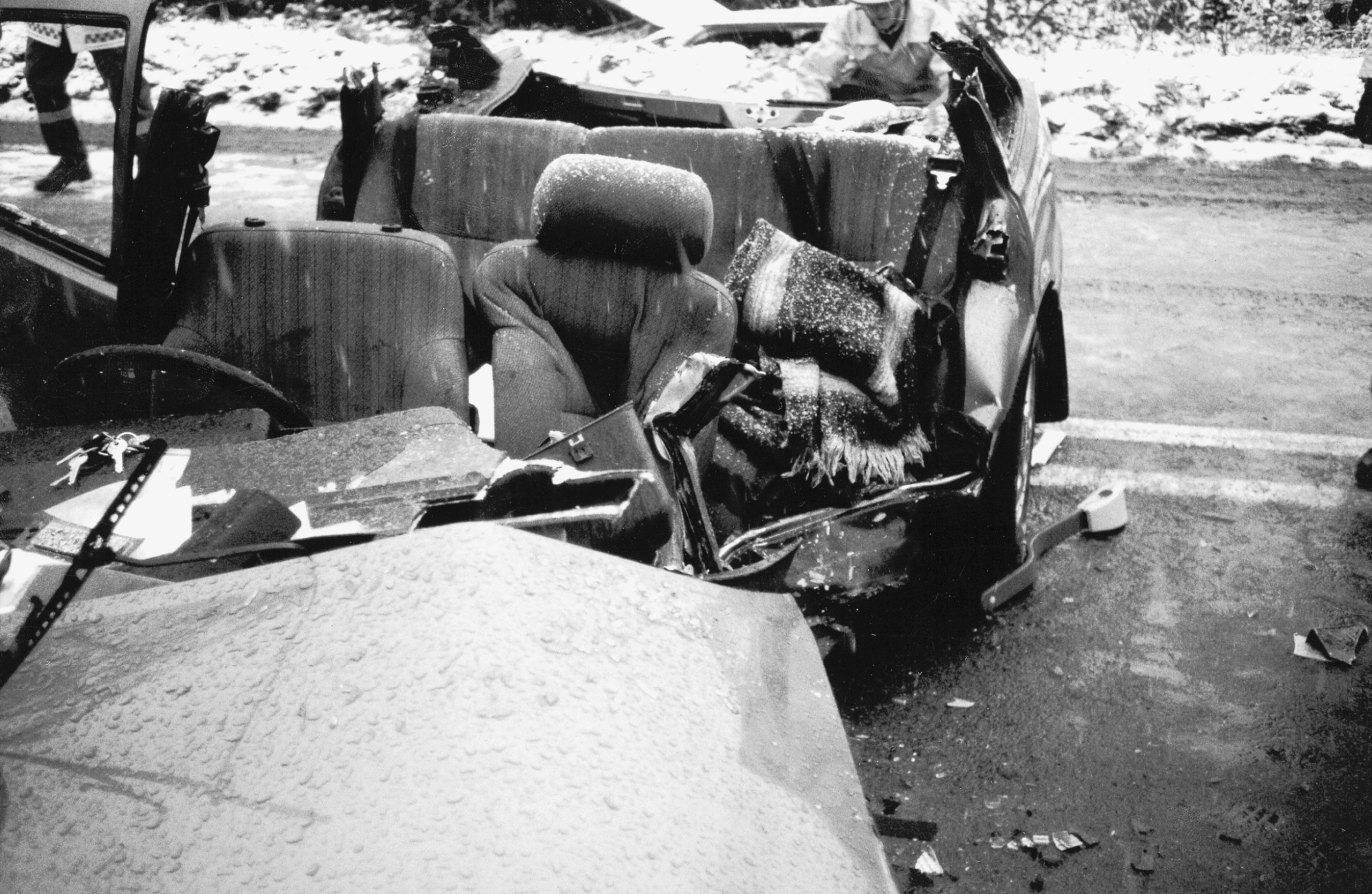 Remains of car with damage from cutting passenger free