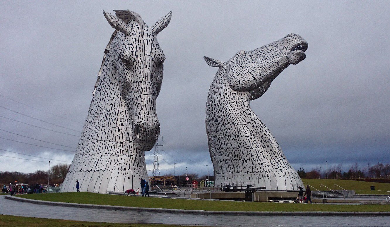 Two sculpted horses heads