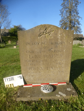 Memorial with a flower vase inset in front.