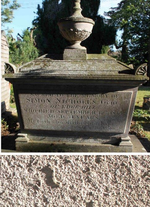 Casket-shaped monument