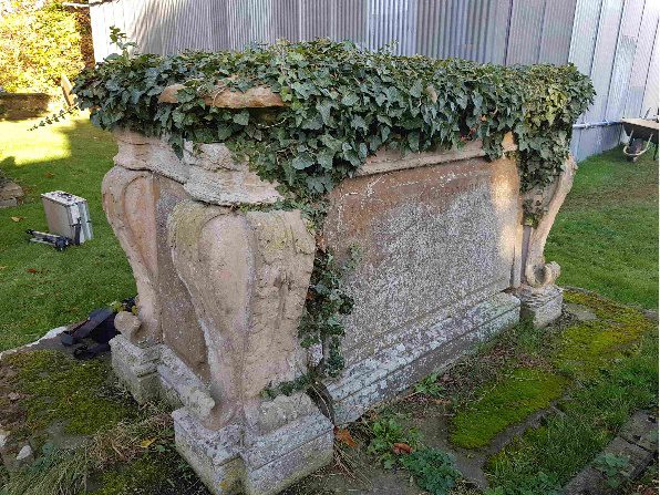 Casket-shaped monument