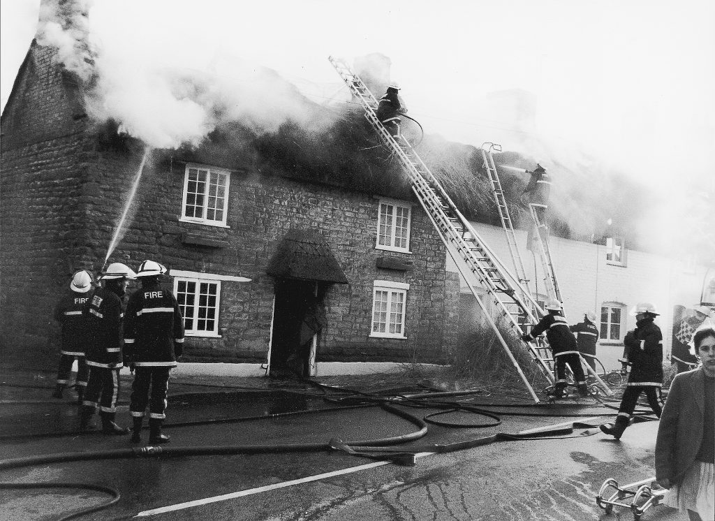 Fire brigade attending a house fire