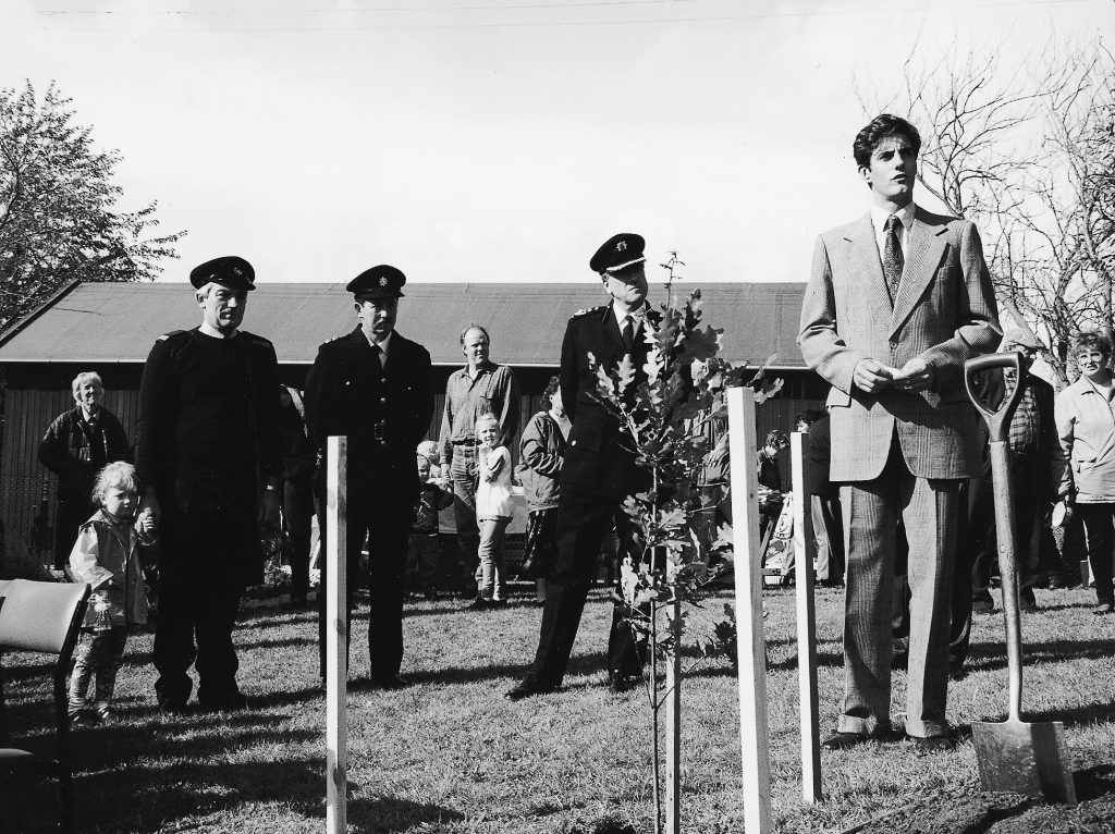 People watching a tree planting ceremony