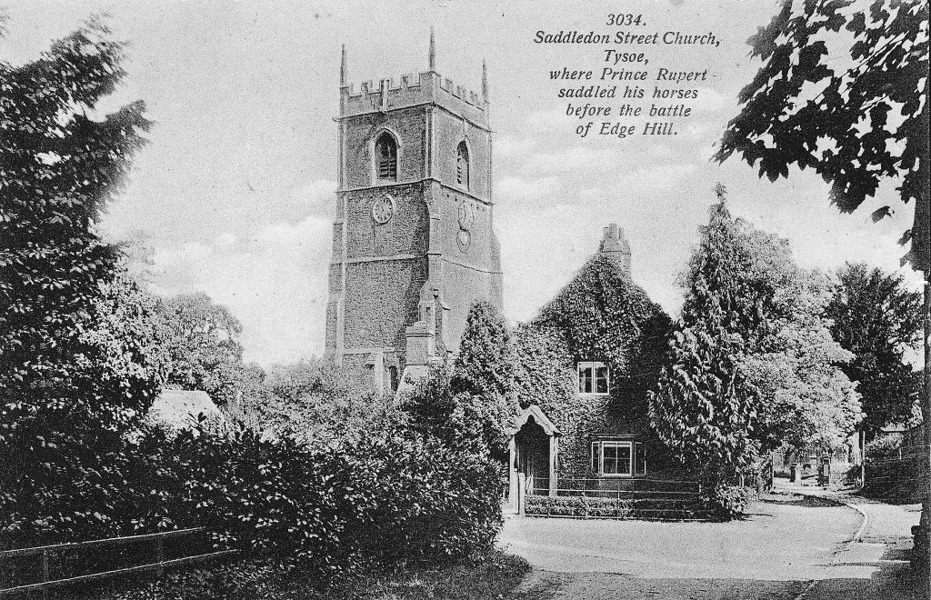 Church tower with cottage in foreground