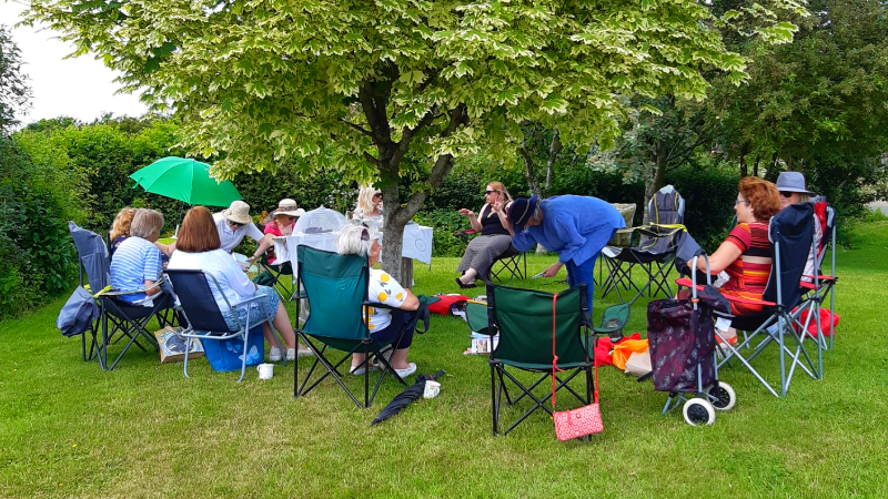 Laugh and Craft ladies under a tree