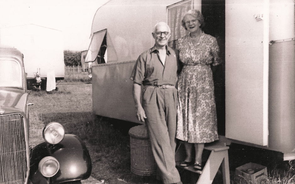 Couple in the doorway of a caravan